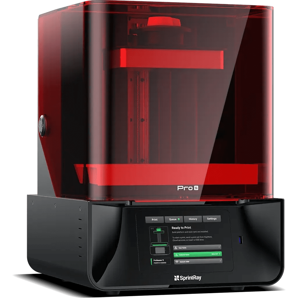A red printer is sitting on top of a green background.